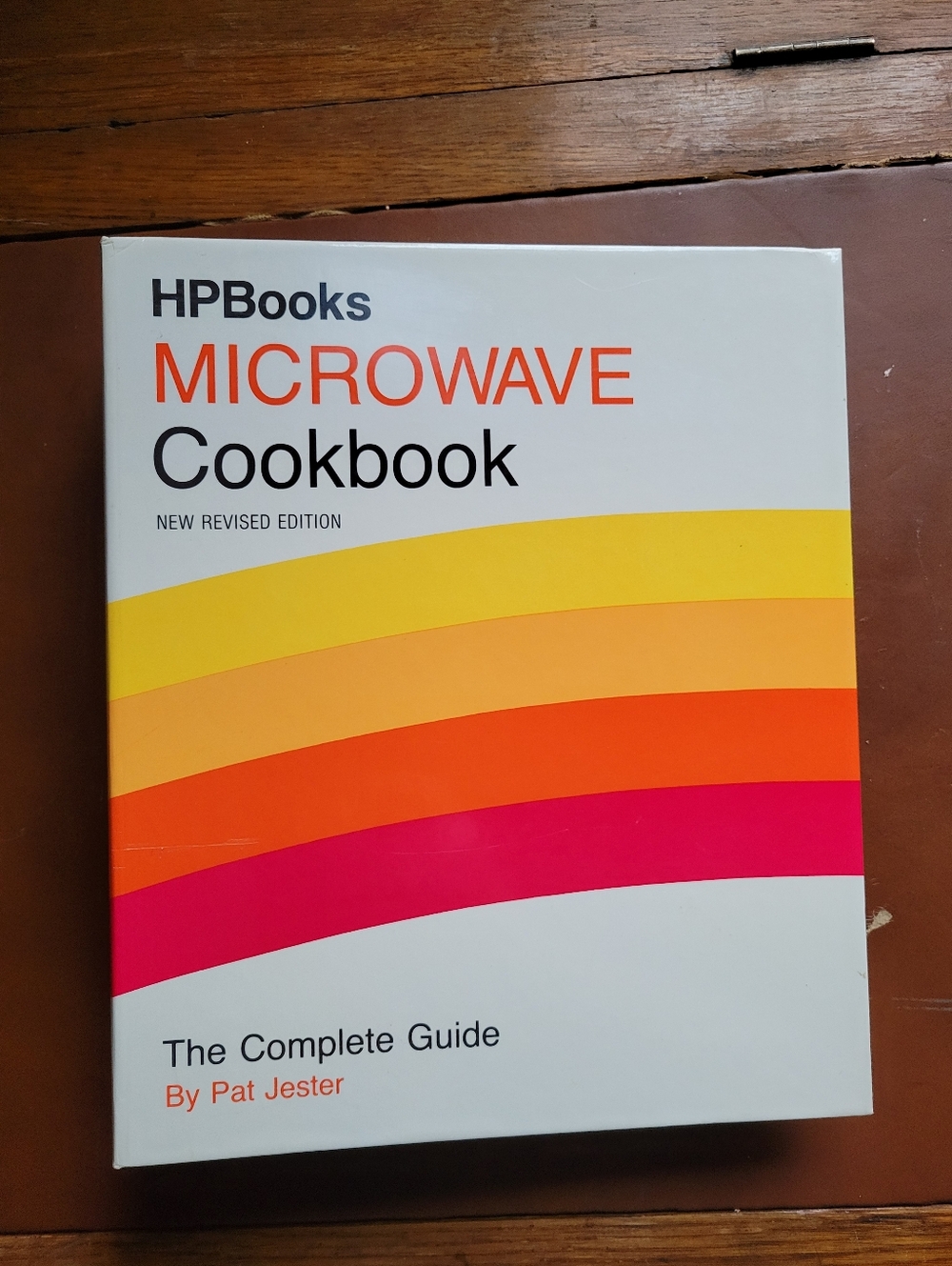 HPBooks Microwave Cookbook - White with Yellow, Orange, Red & Pink Stripes